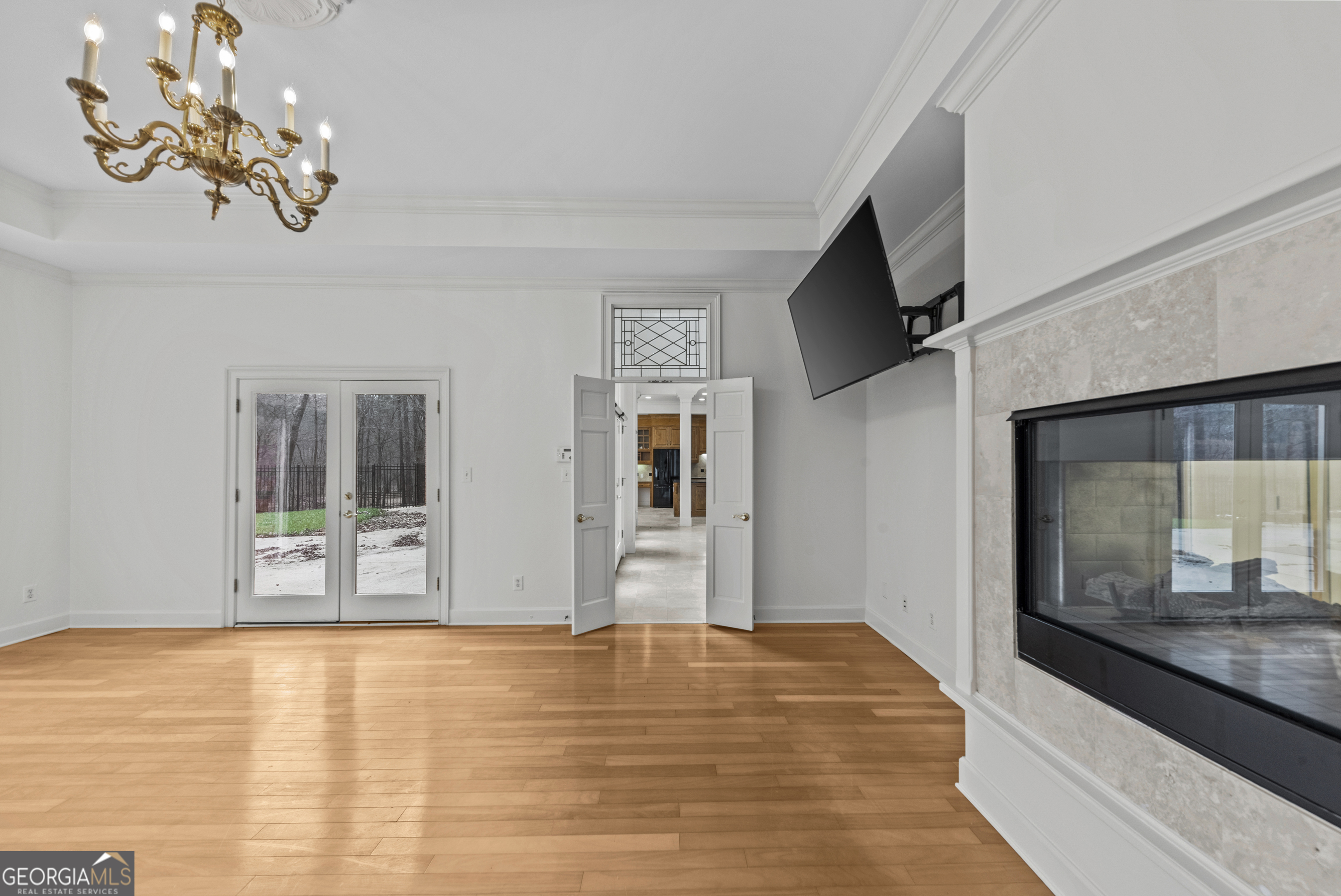 1171 River Run Bishop, GA 30621 - Photo 35 of 78 a view of an empty room with window and wooden floor