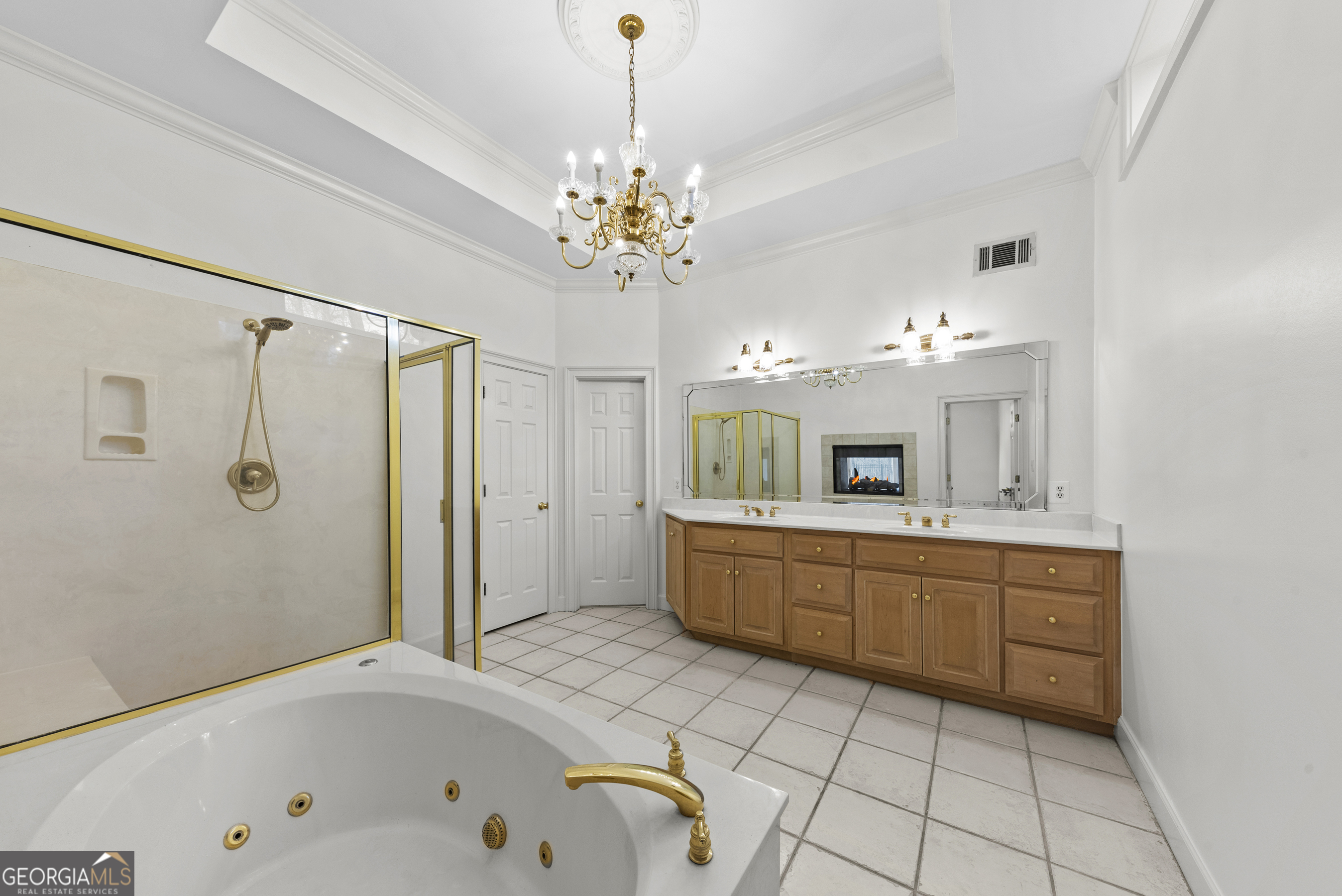 1171 River Run Bishop, GA 30621 - Photo 36 of 78 a bathroom with a tub a sink shower and a mirror