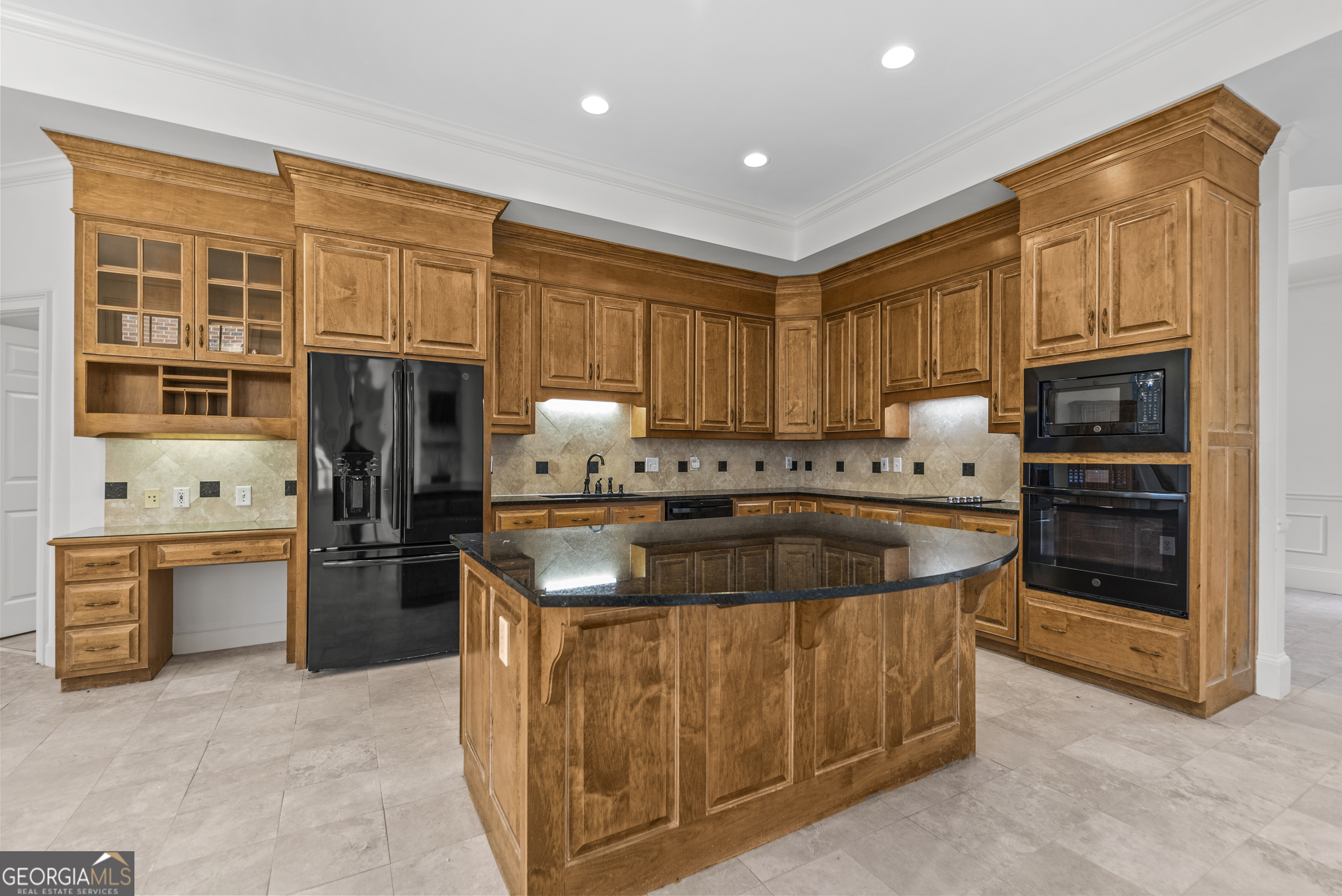 1171 River Run Bishop, GA 30621 - Photo 43 of 78 a kitchen with stainless steel appliances granite countertop a stove top oven a refrigerator and a sink with granite countertops