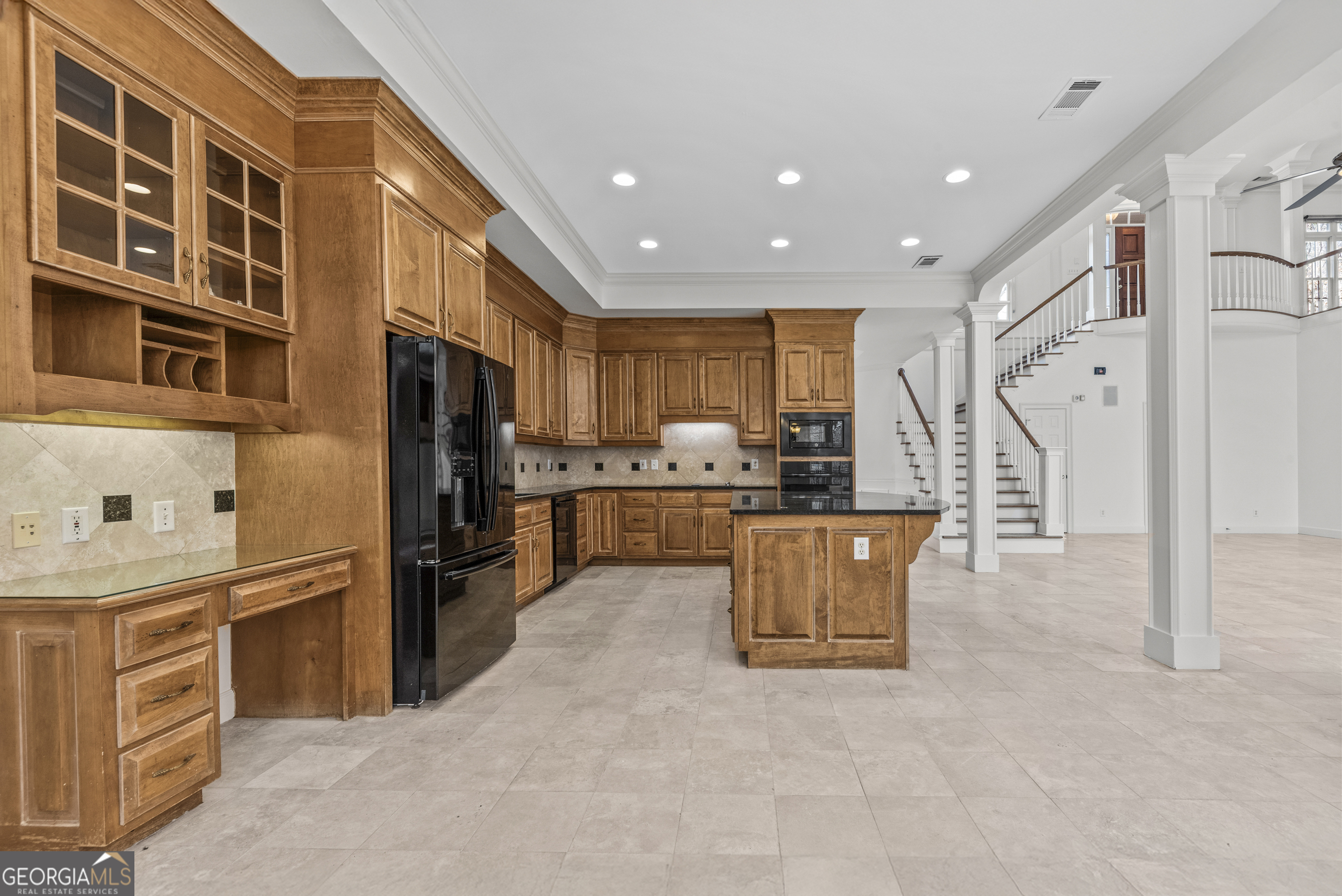 1171 River Run Bishop, GA 30621 - Photo 45 of 78 a kitchen with stainless steel appliances kitchen island granite countertop a refrigerator and a stove top oven