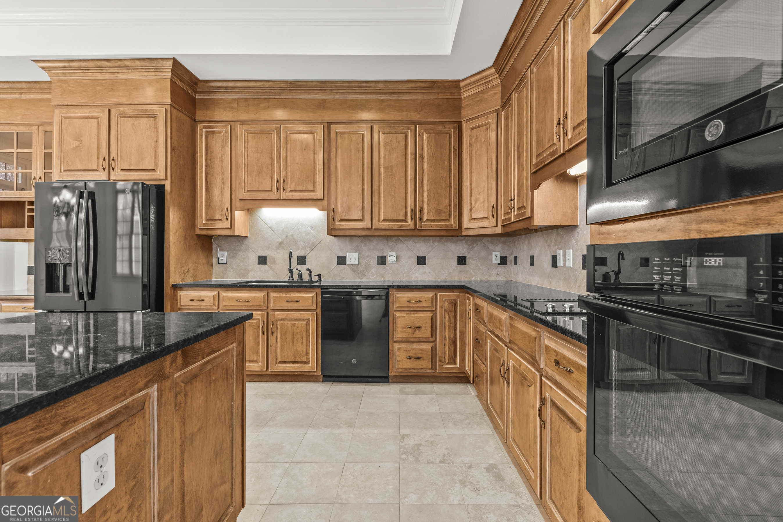 1171 River Run Bishop, GA 30621 - Photo 48 of 78 a kitchen with stainless steel appliances granite countertop a sink stove and refrigerator