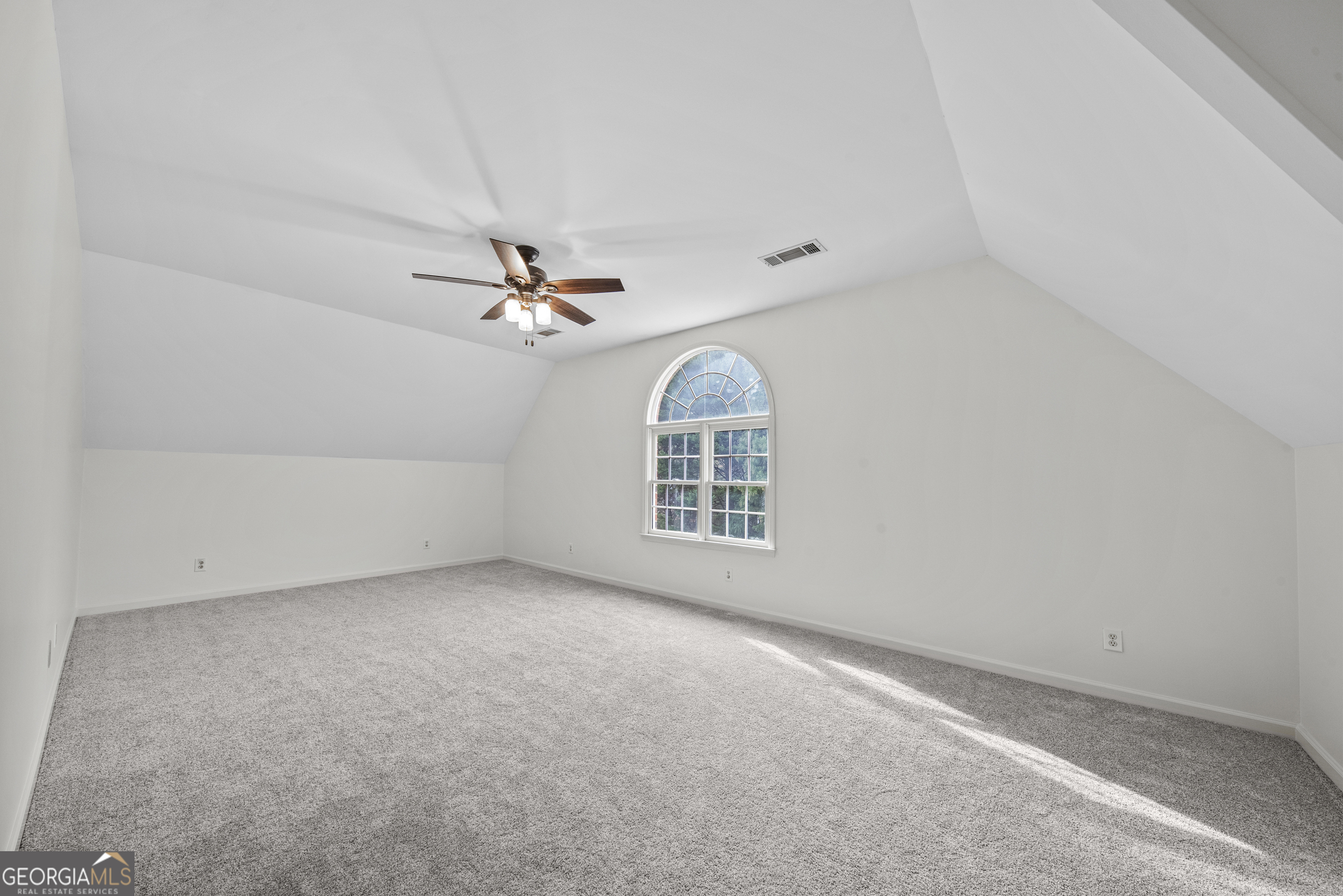 1171 River Run Bishop, GA 30621 - Photo 58 of 78 a view of a livingroom with a ceiling fan and window