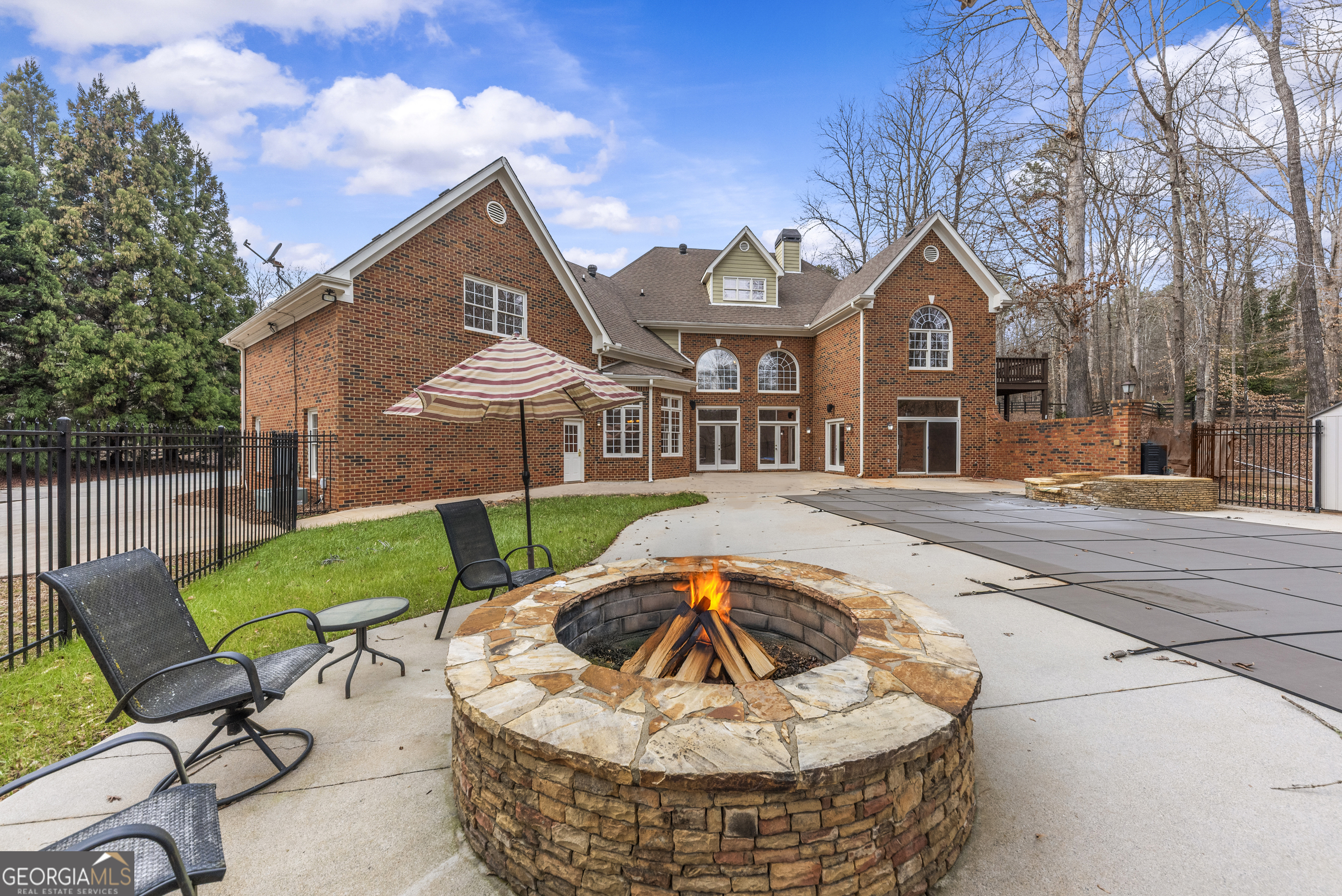 1171 River Run Bishop, GA 30621 - Photo 68 of 78 a view of a house with backyard and sitting area