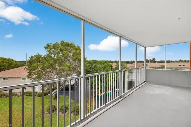 a view of balcony with furniture