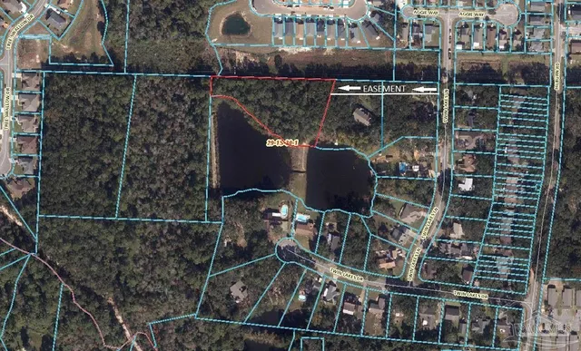 a view of a city with lush green forest