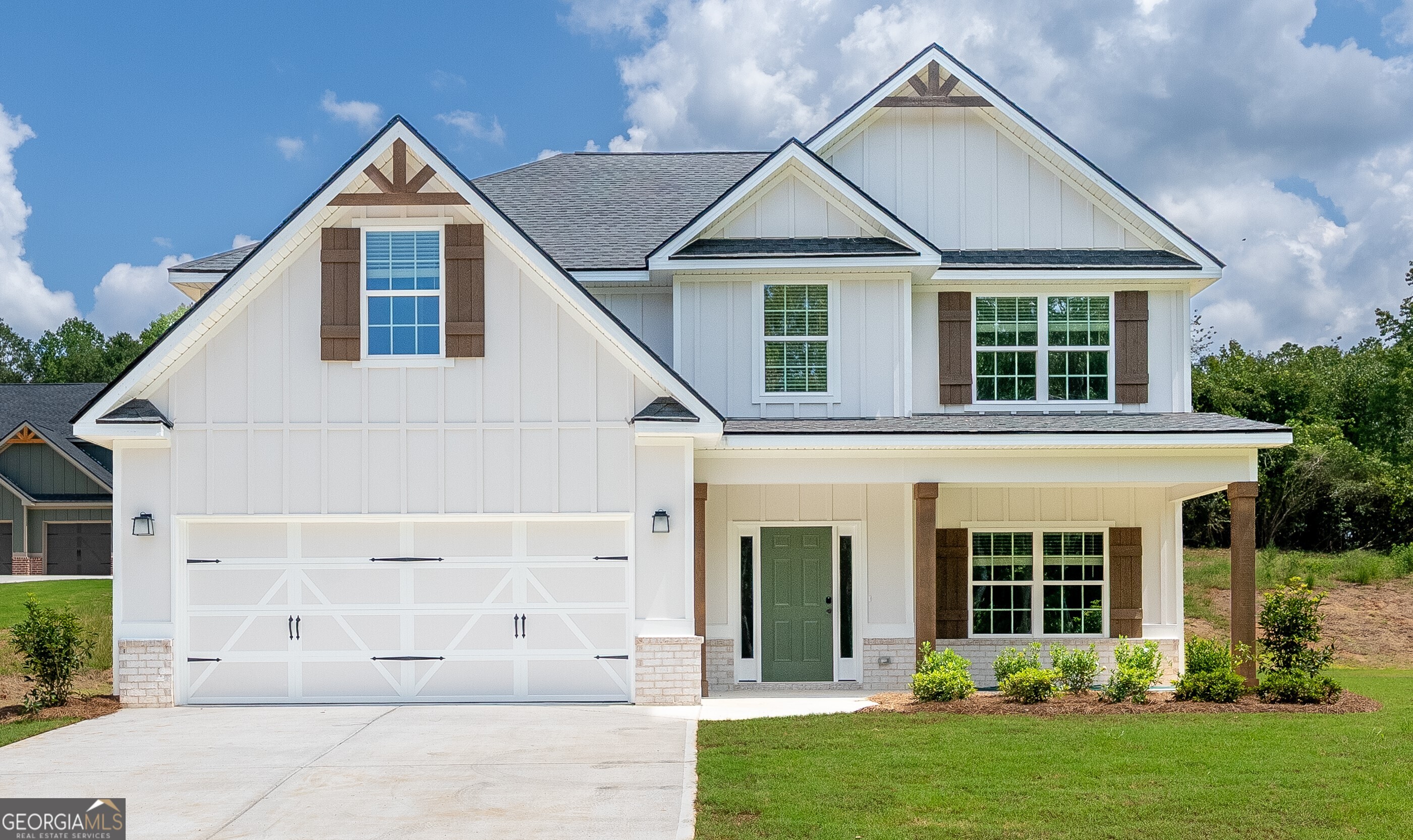 front view of a house and a yard