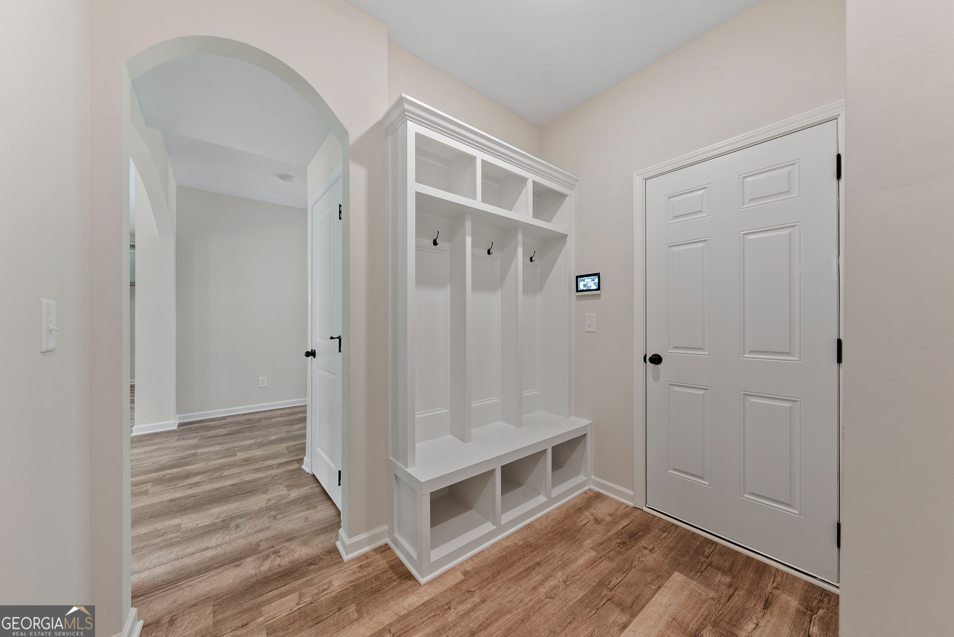 575 Bohannon Road, Unit 8 Grantville, GA 30220 - Photo 13 of 33 a view of a hallway with wooden floor and entryway