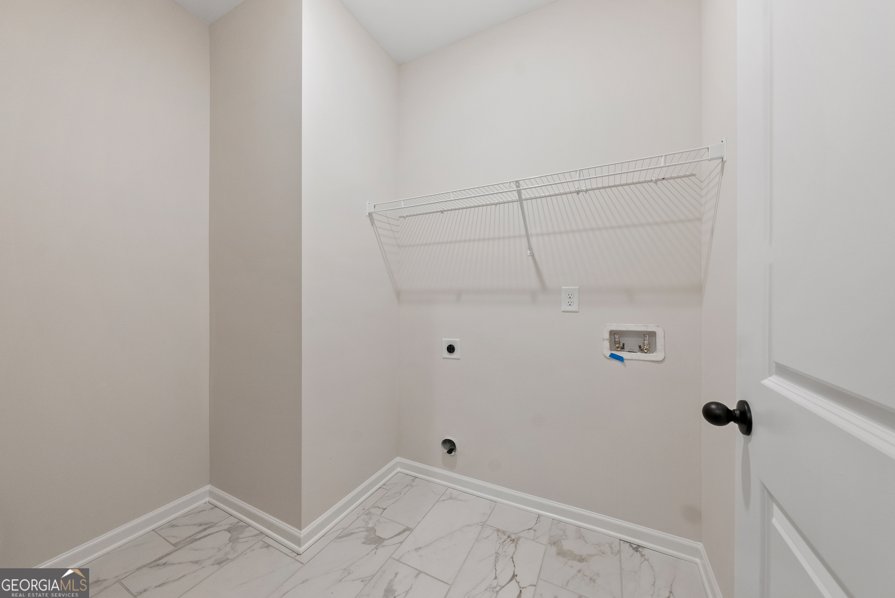 575 Bohannon Road, Unit 8 Grantville, GA 30220 - Photo 15 of 33 a view of a room with racks on the wall