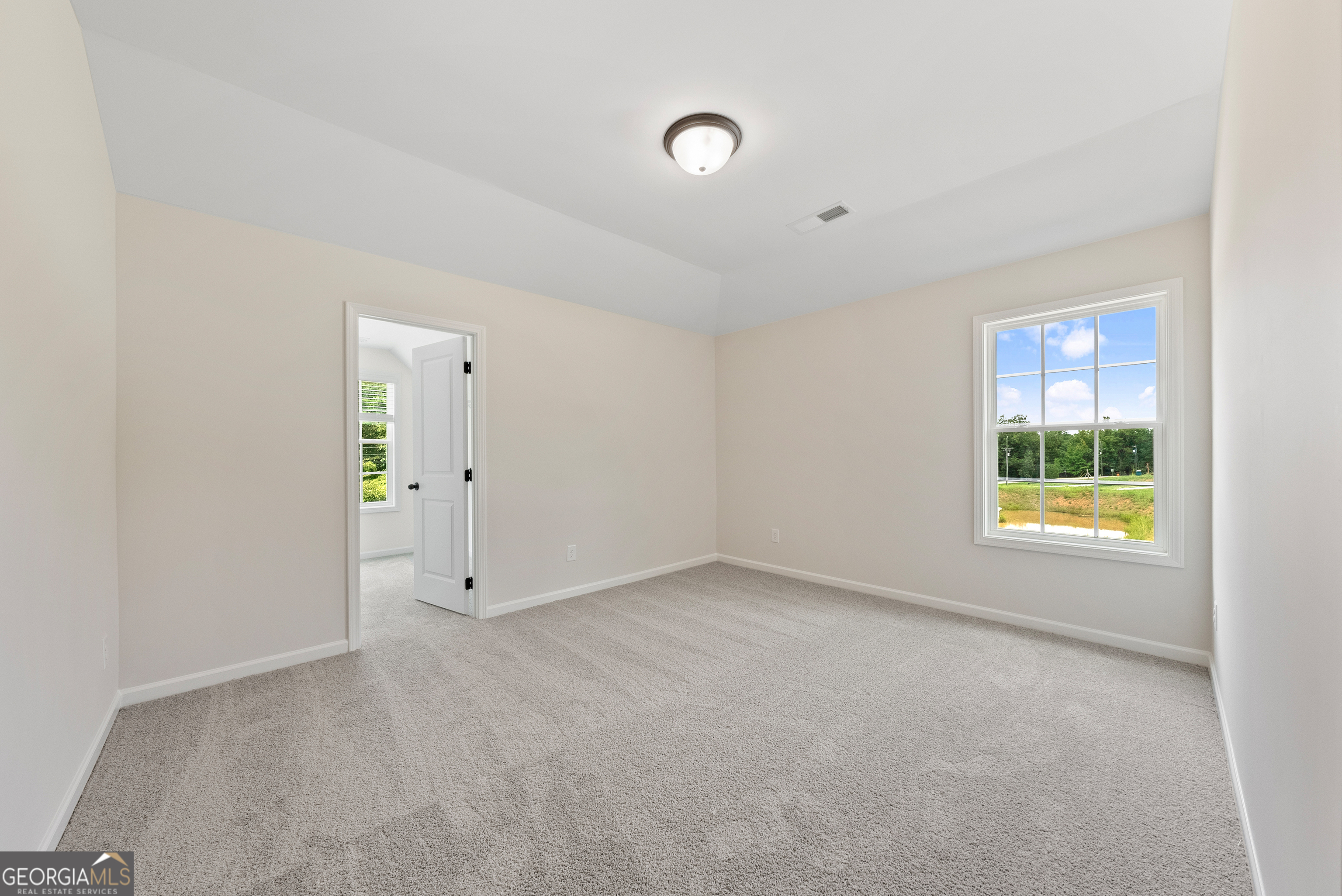 575 Bohannon Road, Unit 8 Grantville, GA 30220 - Photo 18 of 33 a view of an empty room with a window