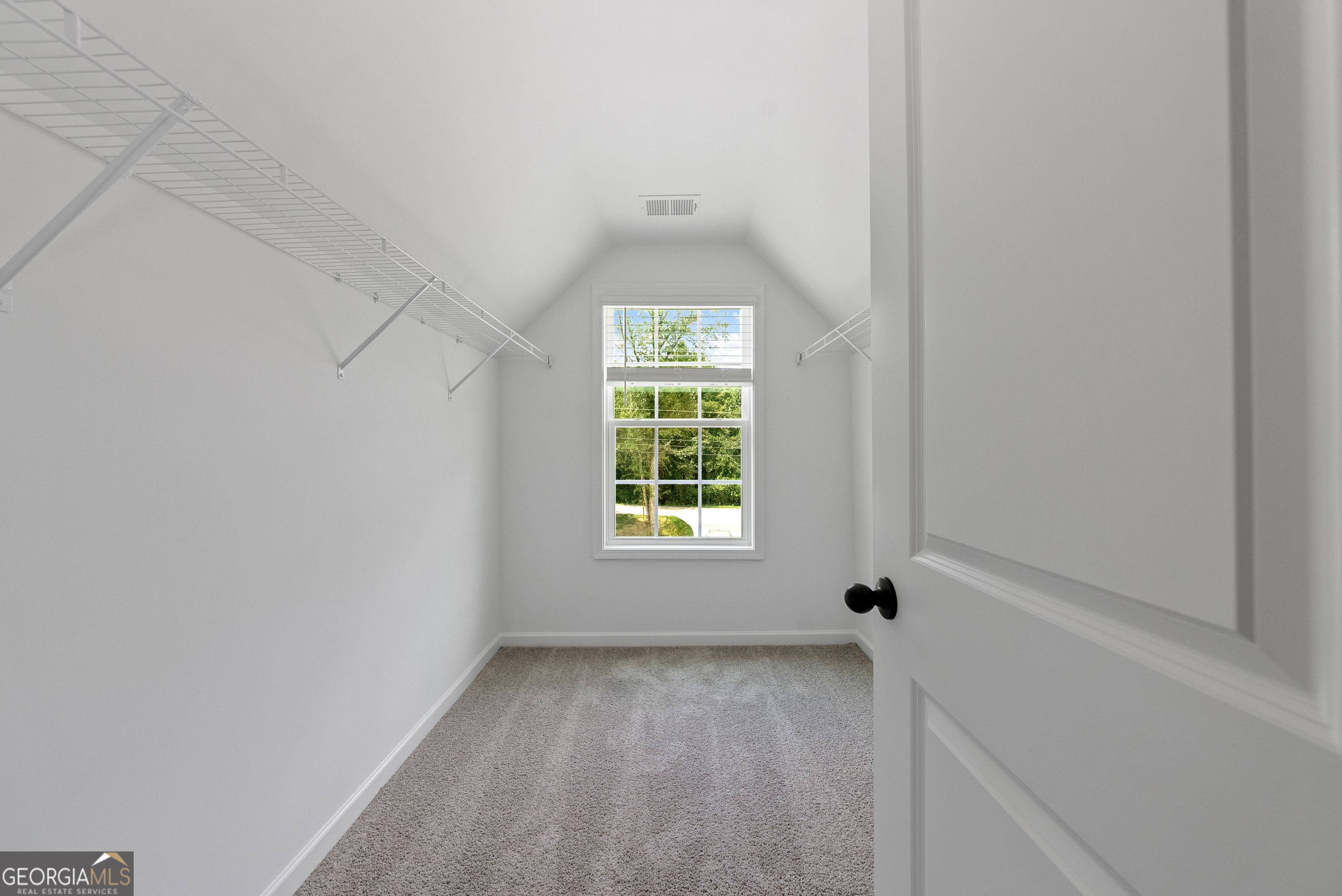 575 Bohannon Road, Unit 8 Grantville, GA 30220 - Photo 20 of 33 a view of an empty room with a window