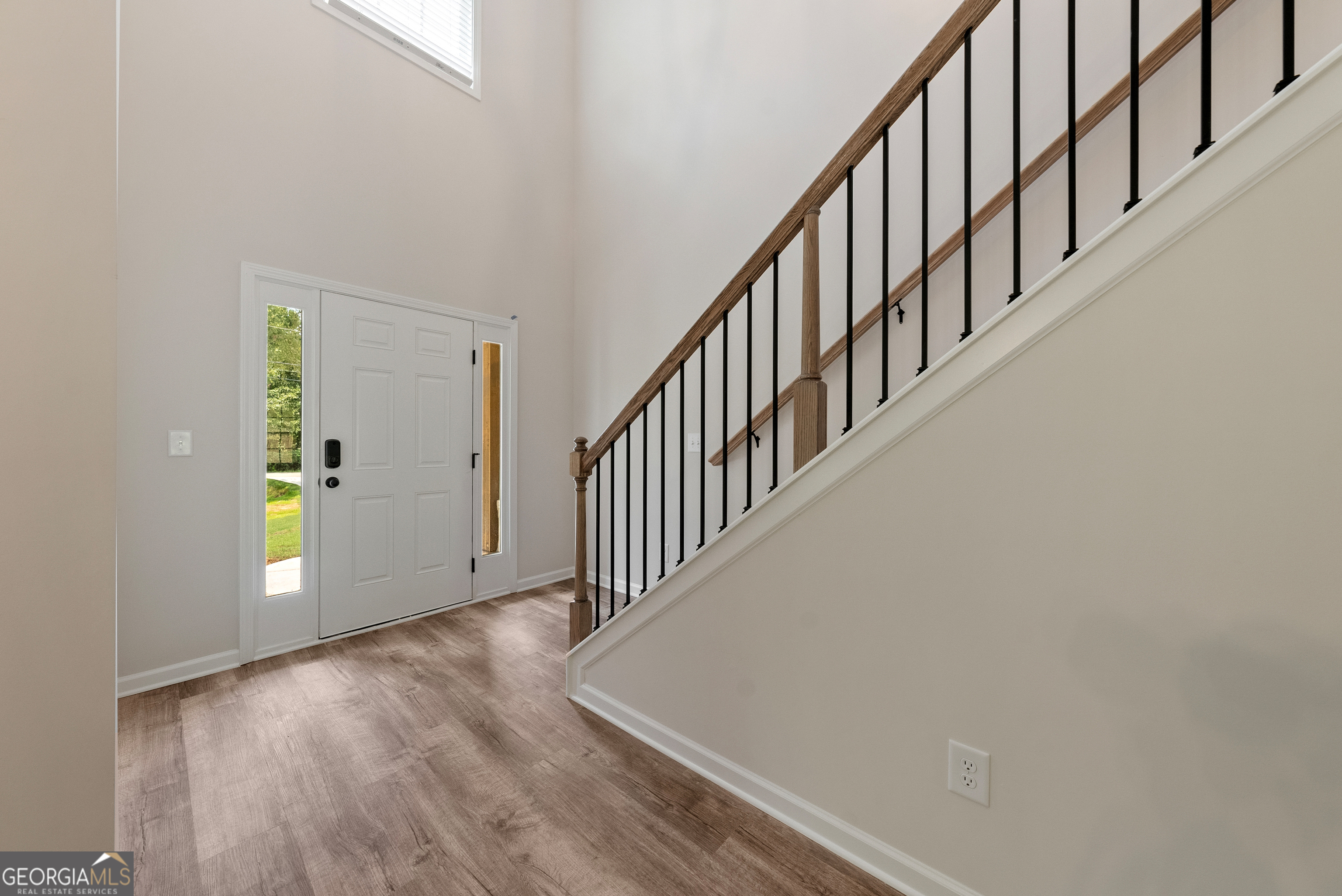 575 Bohannon Road, Unit 8 Grantville, GA 30220 - Photo 2 of 33 a view of an entryway with wooden floor