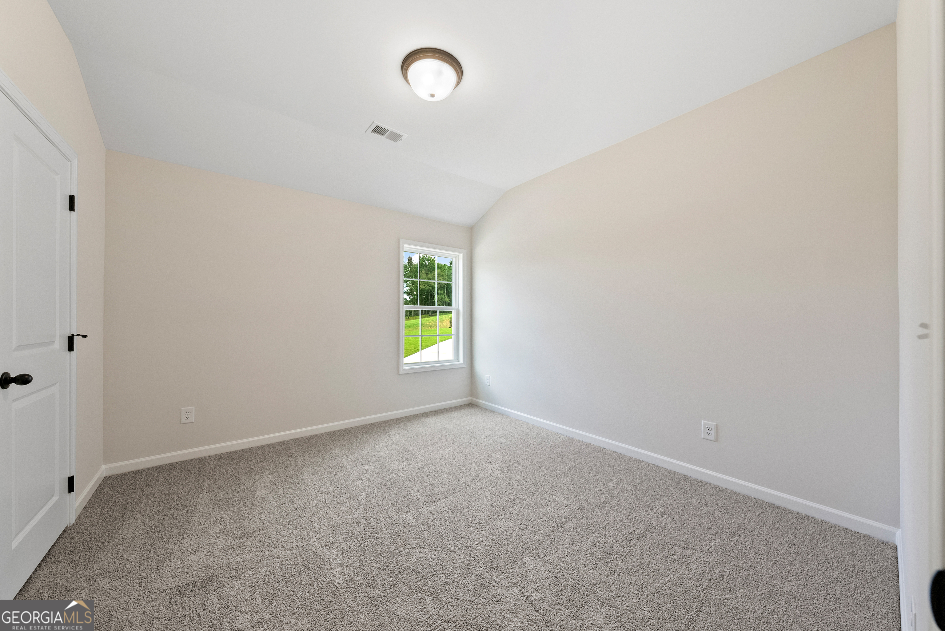 575 Bohannon Road, Unit 8 Grantville, GA 30220 - Photo 21 of 33 an empty room with a window