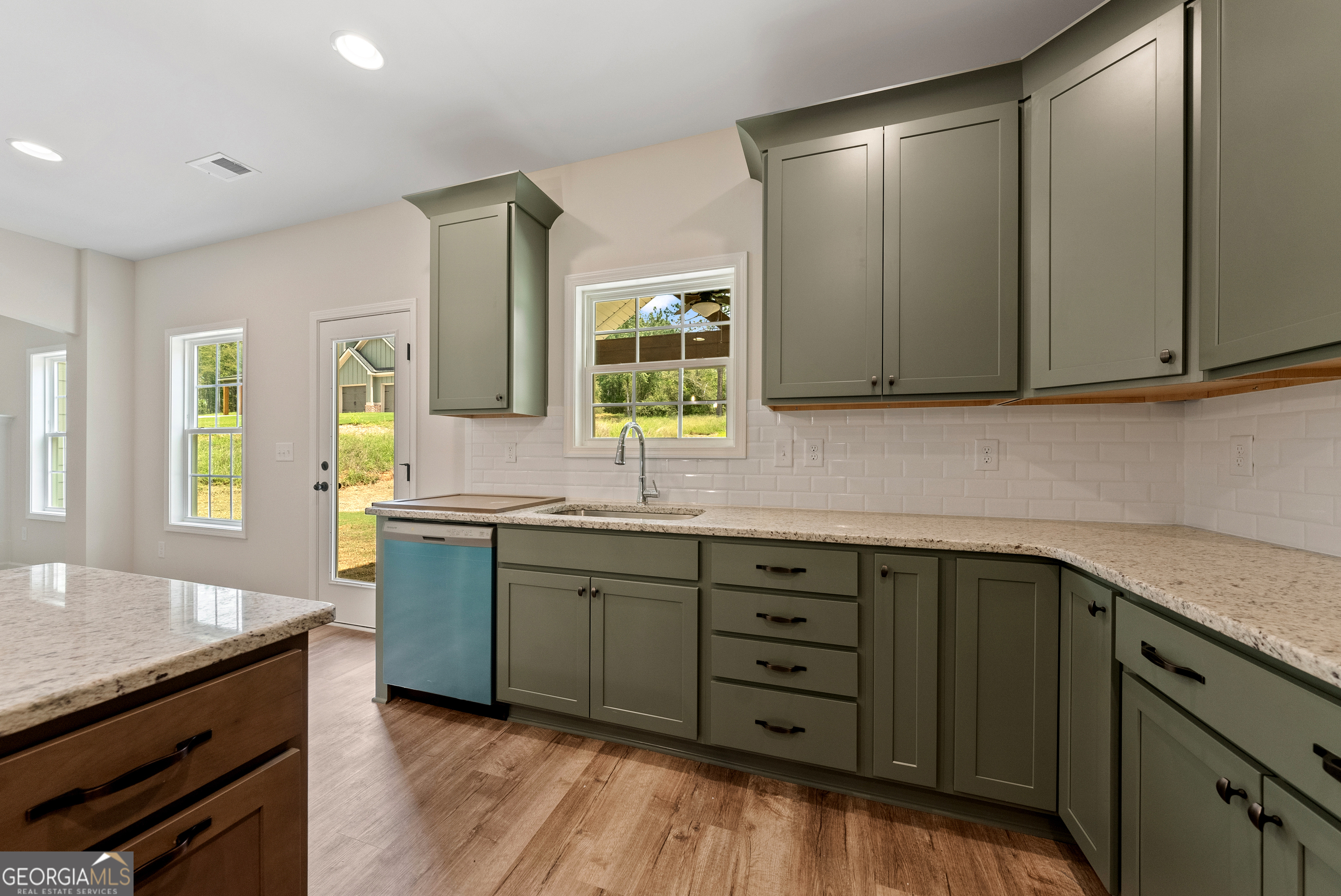 575 Bohannon Road, Unit 8 Grantville, GA 30220 - Photo 10 of 33 a kitchen with sink cabinets and window