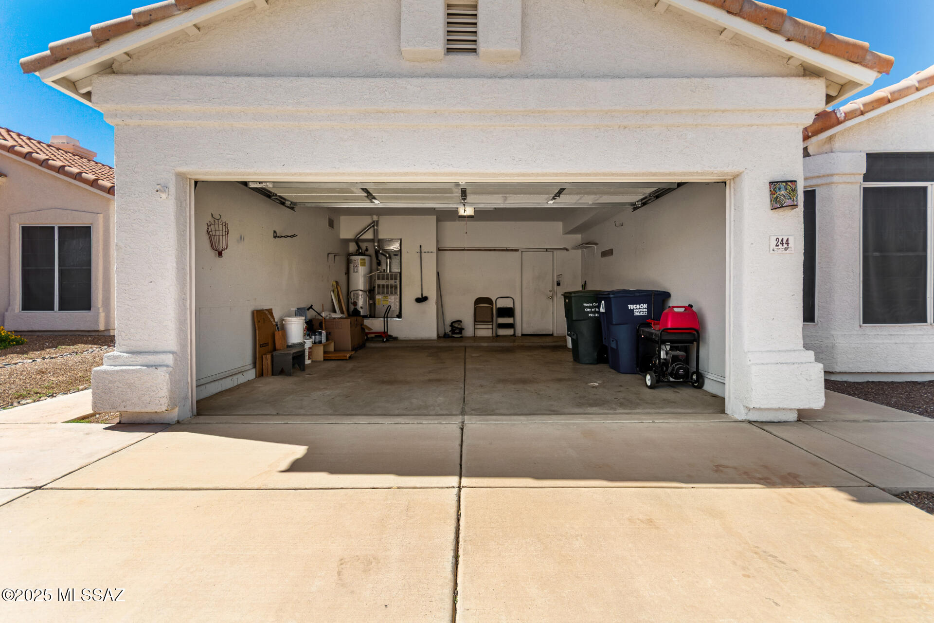 244 South Ridgefield Avenue Tucson, AZ 85748 - Photo 22 of 24 Spacious Garage with Built-in Organization