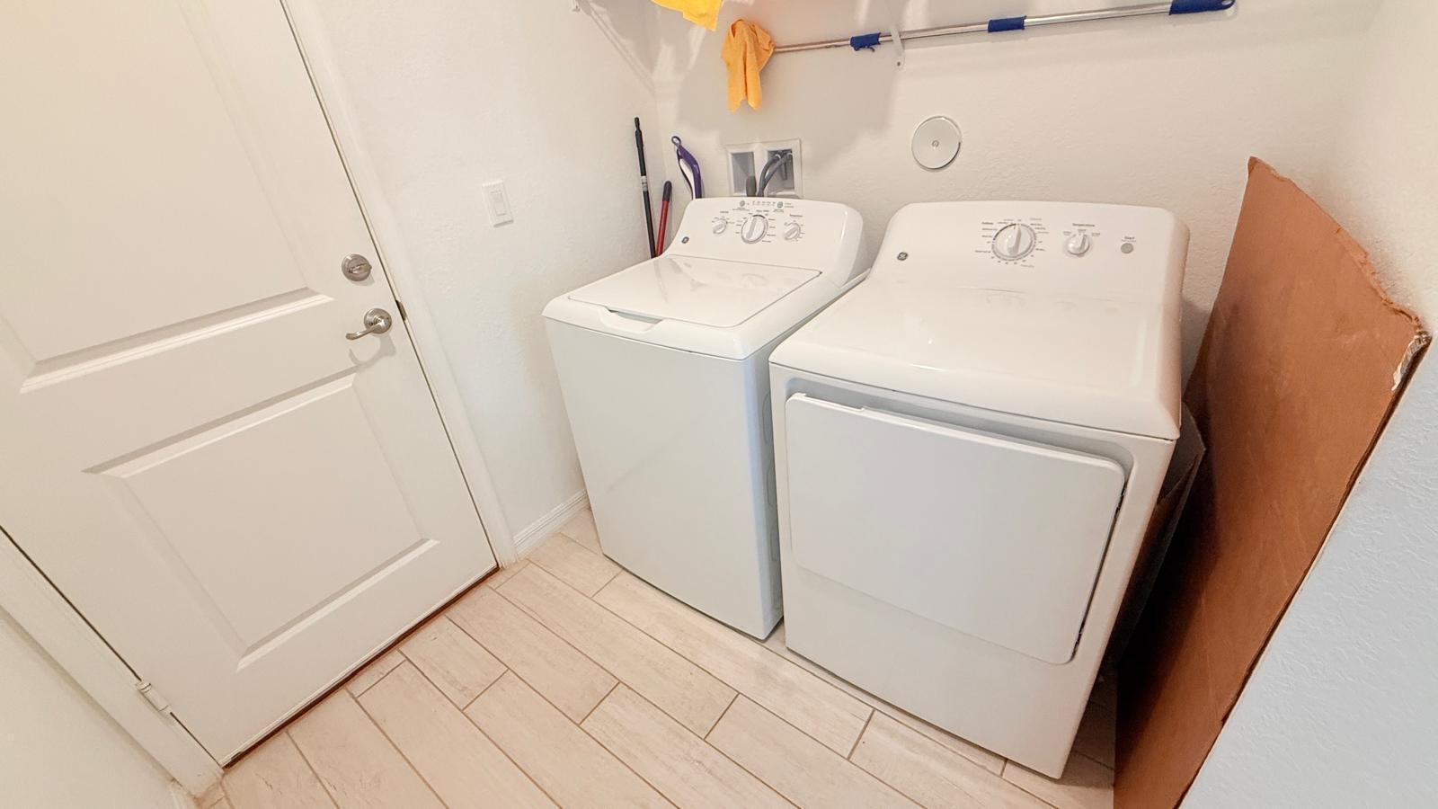 5154 Armina Place Fort Pierce, FL 34951 - Photo 25 of 38 a utility room with dryer and washer