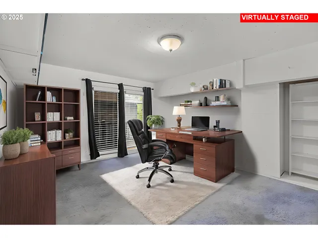 a workspace with furniture and wooden floor