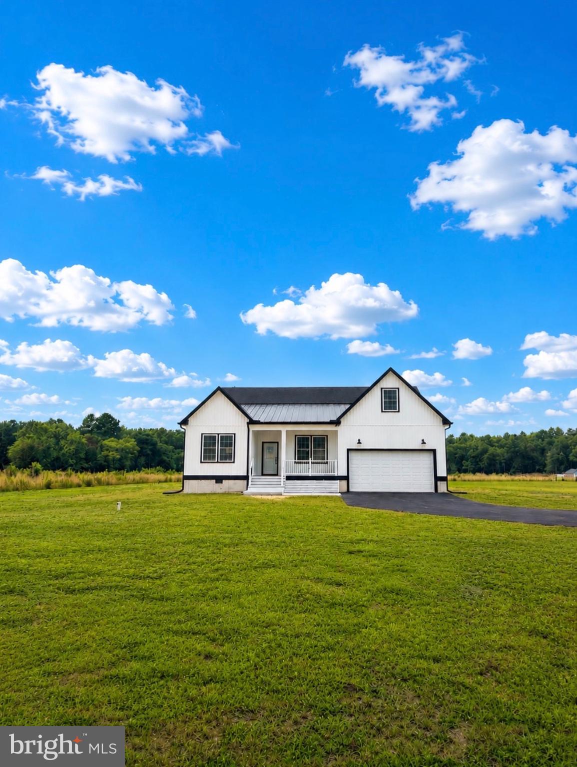 Charming home under a bright sky.