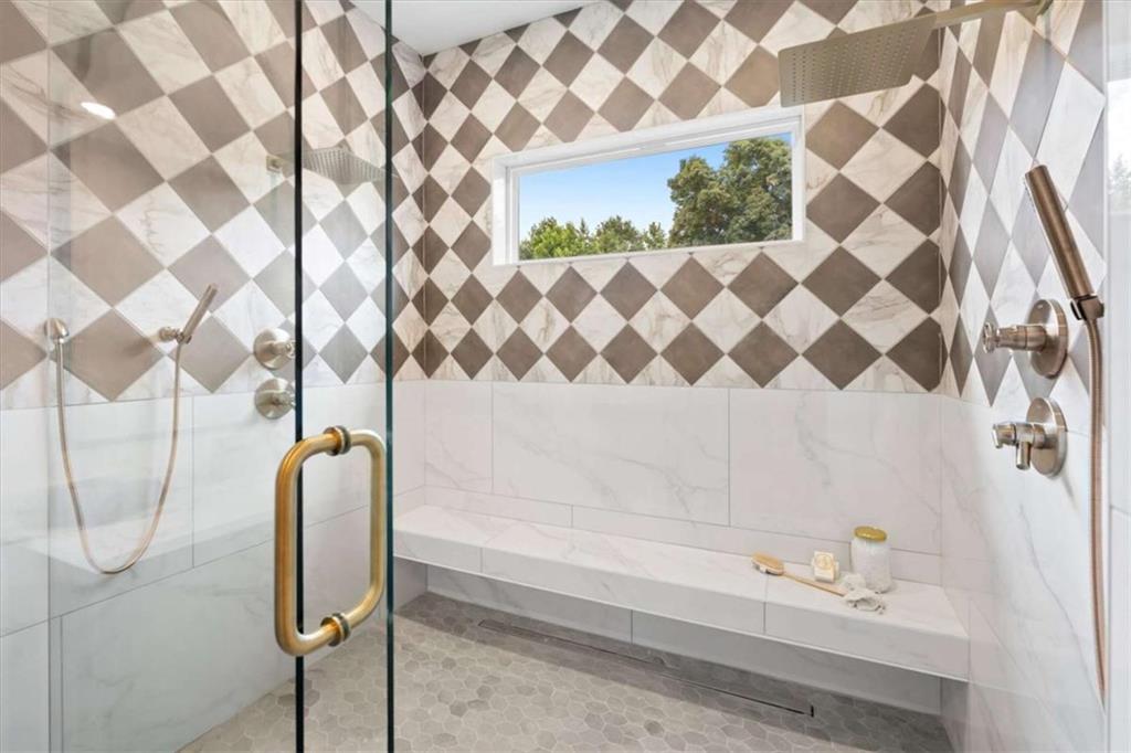 591 Welcome Road Roopville, GA 30170 - Photo 29 of 60 a bathroom with a bathtub and shower