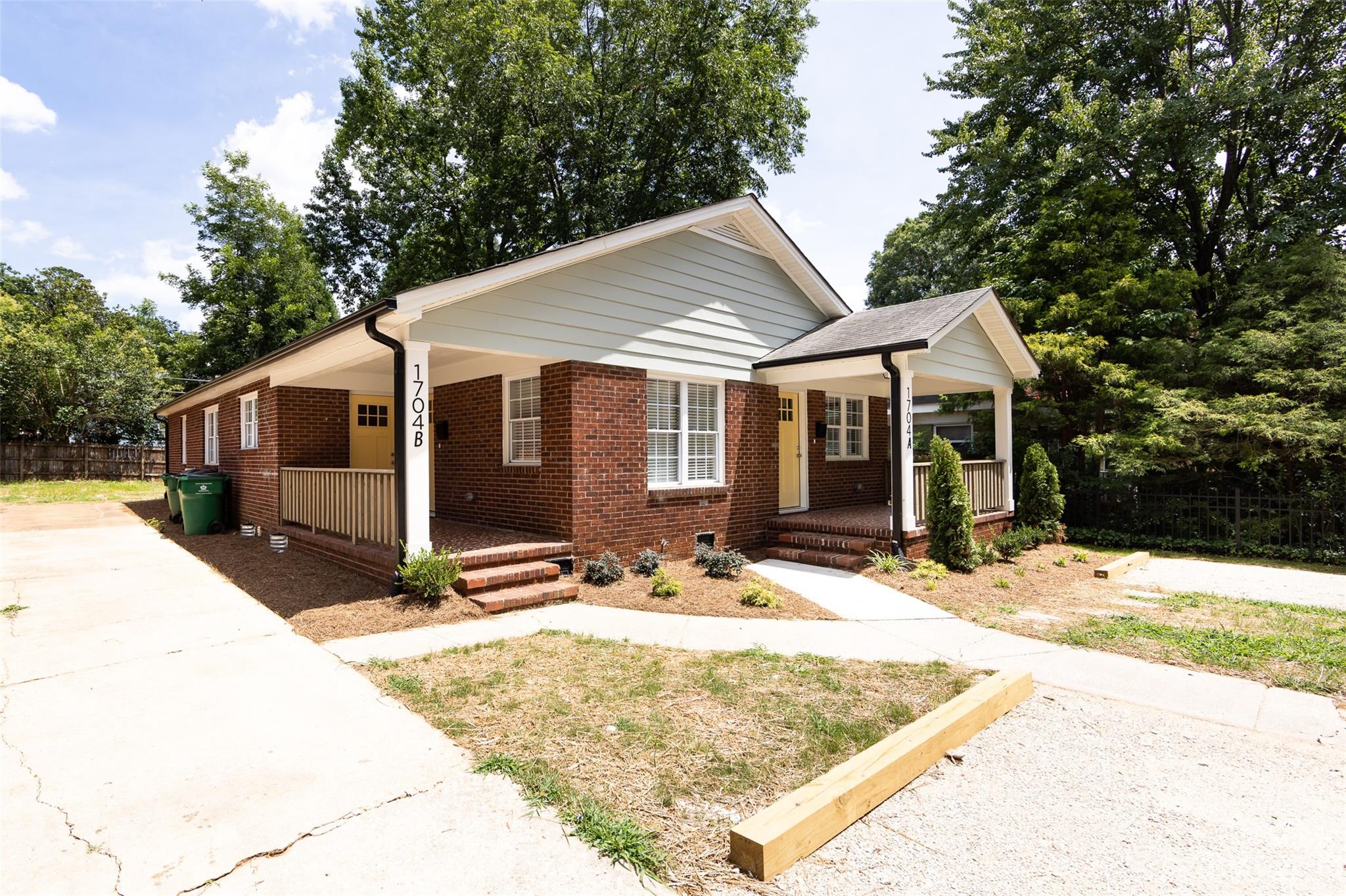 1704 Club Road, Unit A Charlotte, NC 28205 - Photo 2 of 35 a front view of house with yard outdoor seating and yard