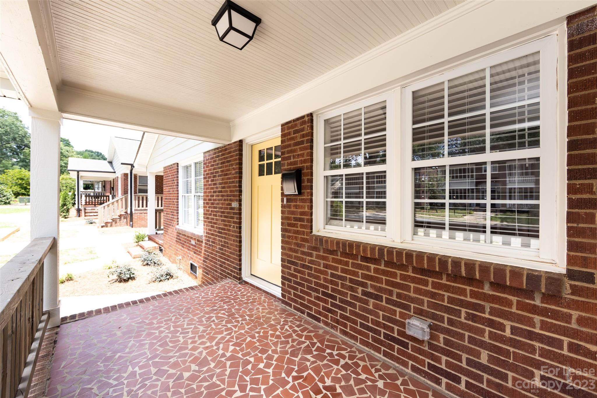 1704 Club Road, Unit A Charlotte, NC 28205 - Photo 5 of 35 a front view of a house with a large window