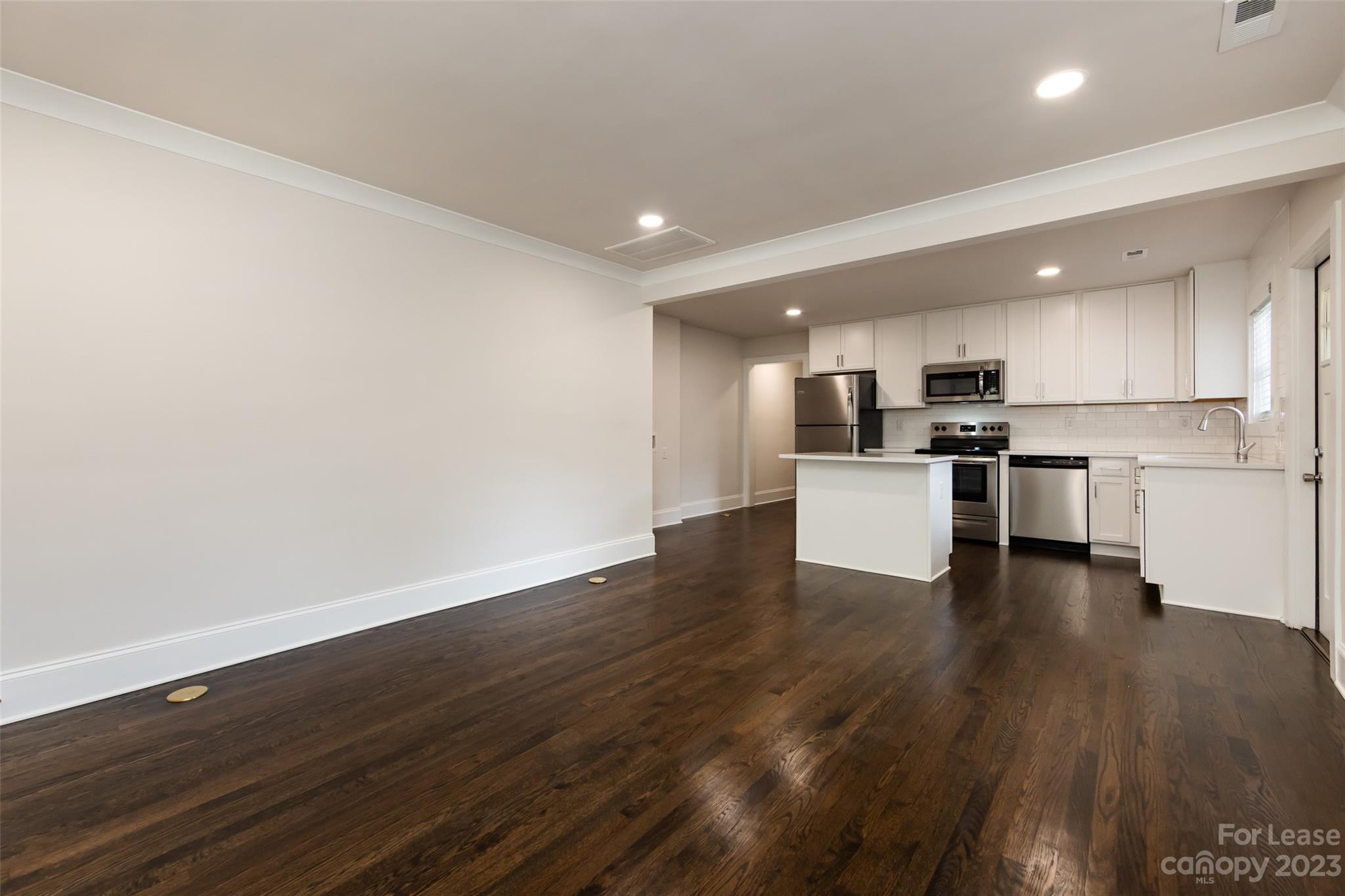 1704 Club Road, Unit A Charlotte, NC 28205 - Photo 10 of 35 a view of kitchen with wooden floor