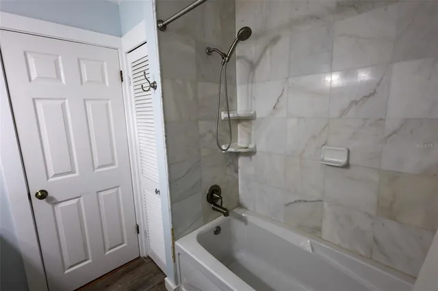 a bathroom with a bathtub