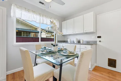 a view of a dining room with furniture