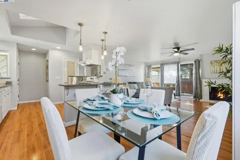 a bedroom with a bed and a potted plant