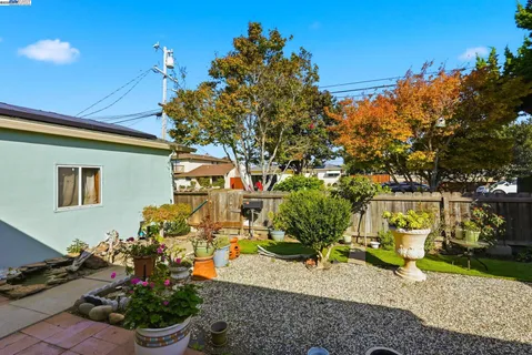 a backyard of a house with seating space