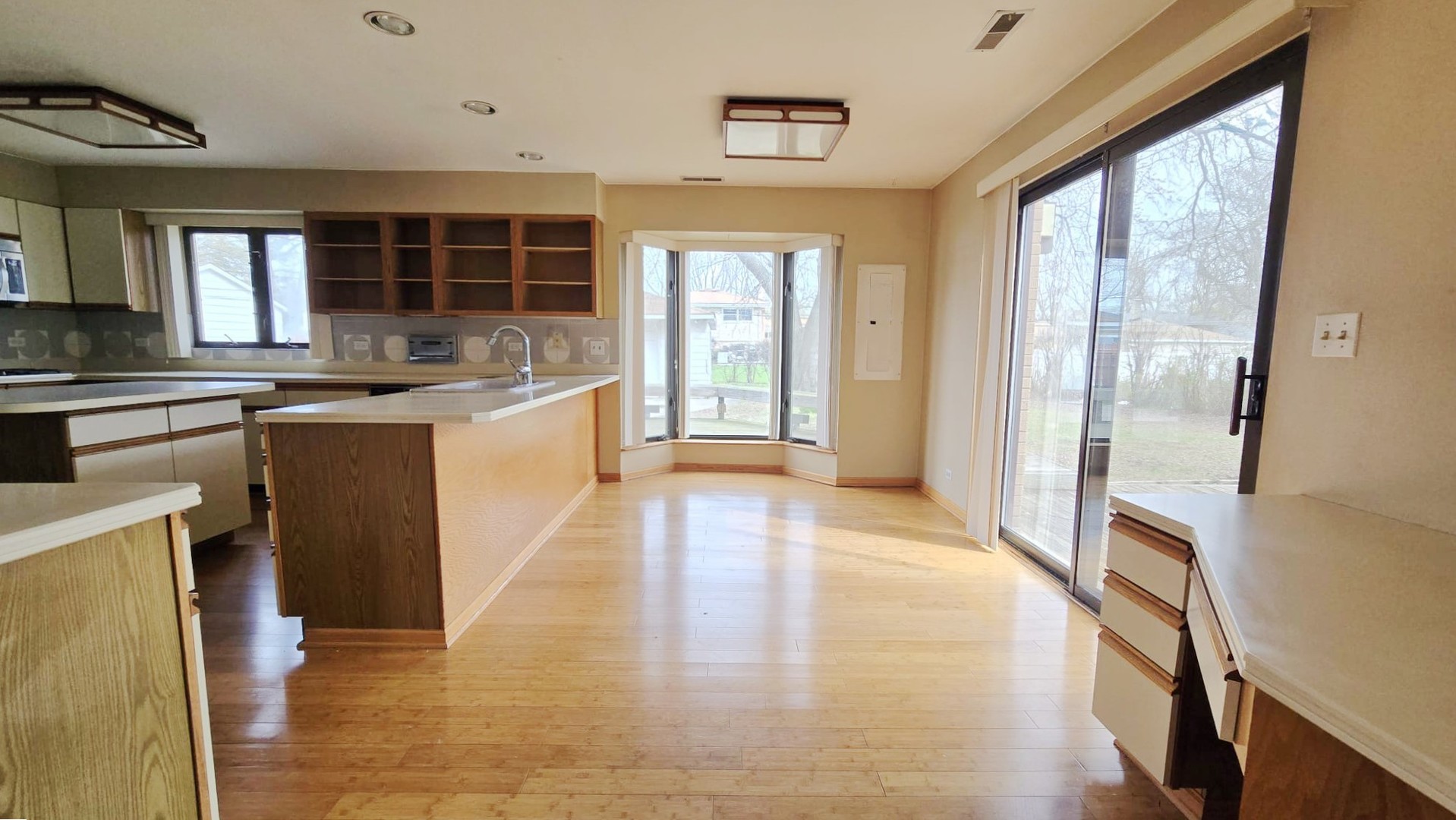 2736 Helen Drive Glenview, IL 60025 - Photo 21 of 47 a large kitchen with stainless steel appliances granite countertop a large counter top a stove and a refrigerator