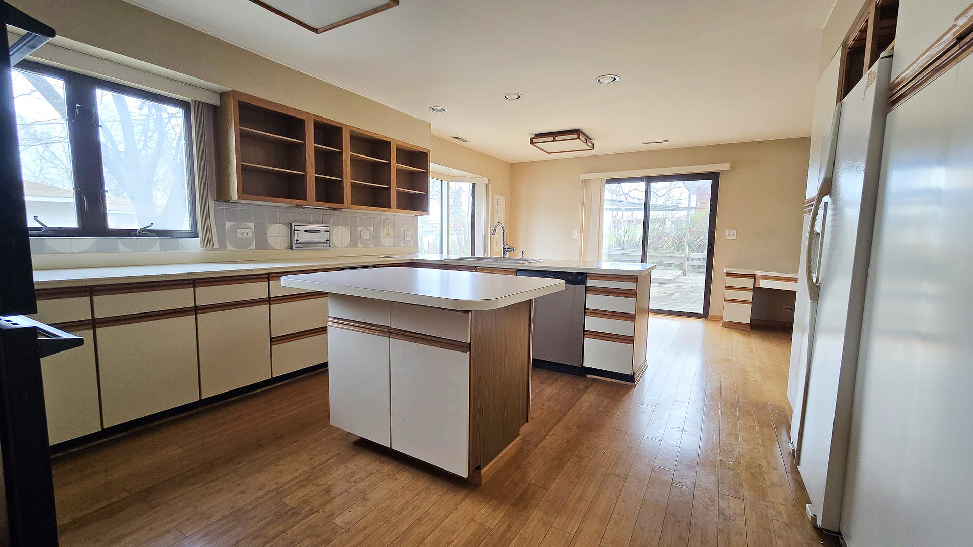 2736 Helen Drive Glenview, IL 60025 - Photo 23 of 47 a kitchen with counter top space and wooden floor
