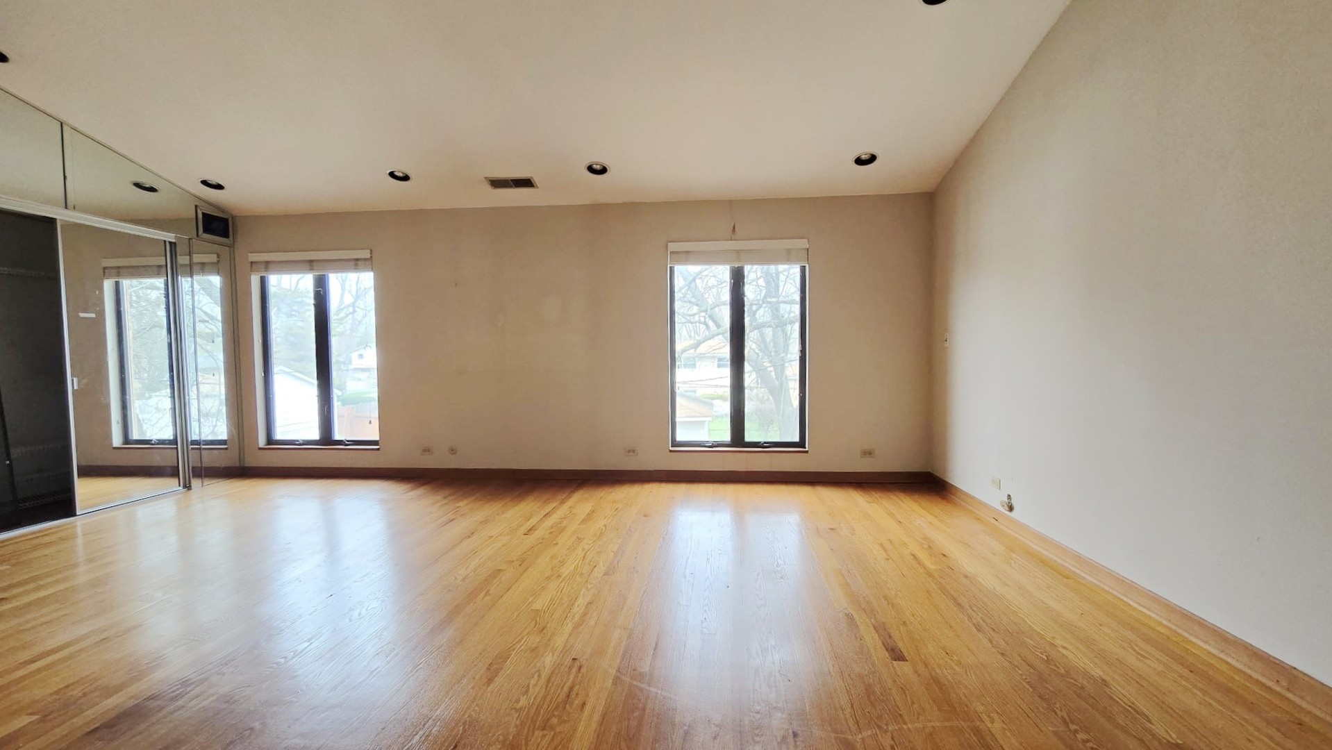 2736 Helen Drive Glenview, IL 60025 - Photo 27 of 47 a view of an empty room with wooden floor and a window