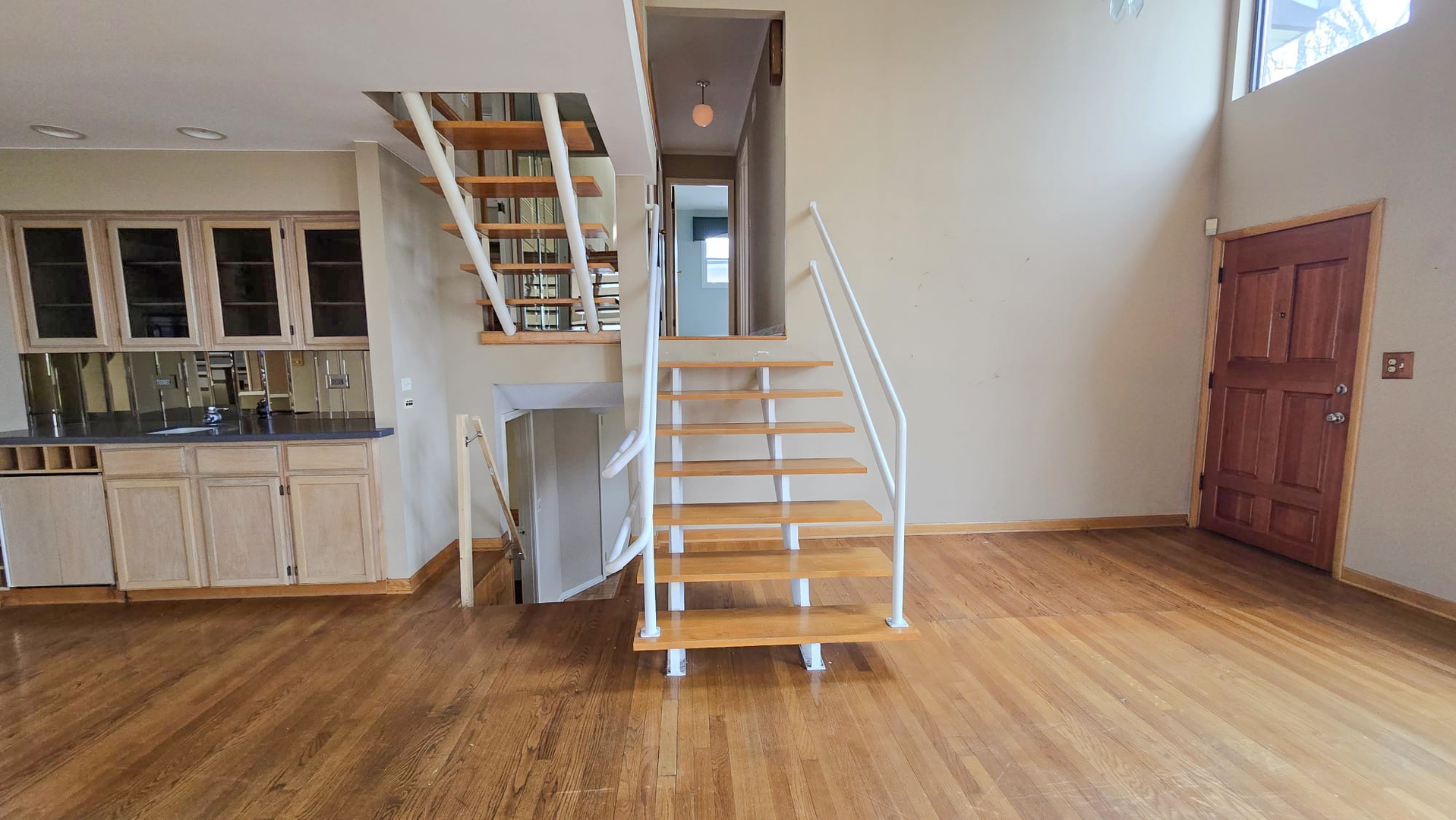 2736 Helen Drive Glenview, IL 60025 - Photo 32 of 47 an empty room with wooden floor and windows