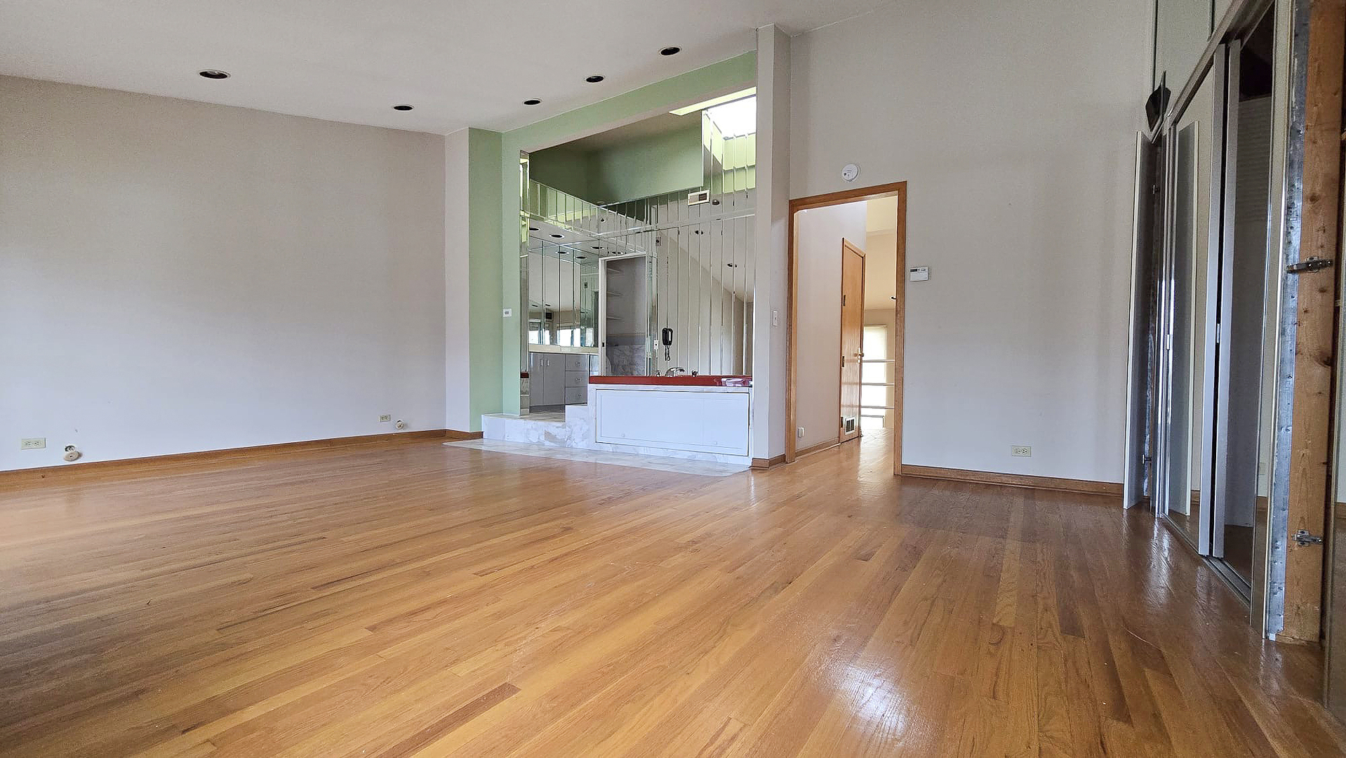 2736 Helen Drive Glenview, IL 60025 - Photo 35 of 47 a view of an empty room with wooden floor and a window