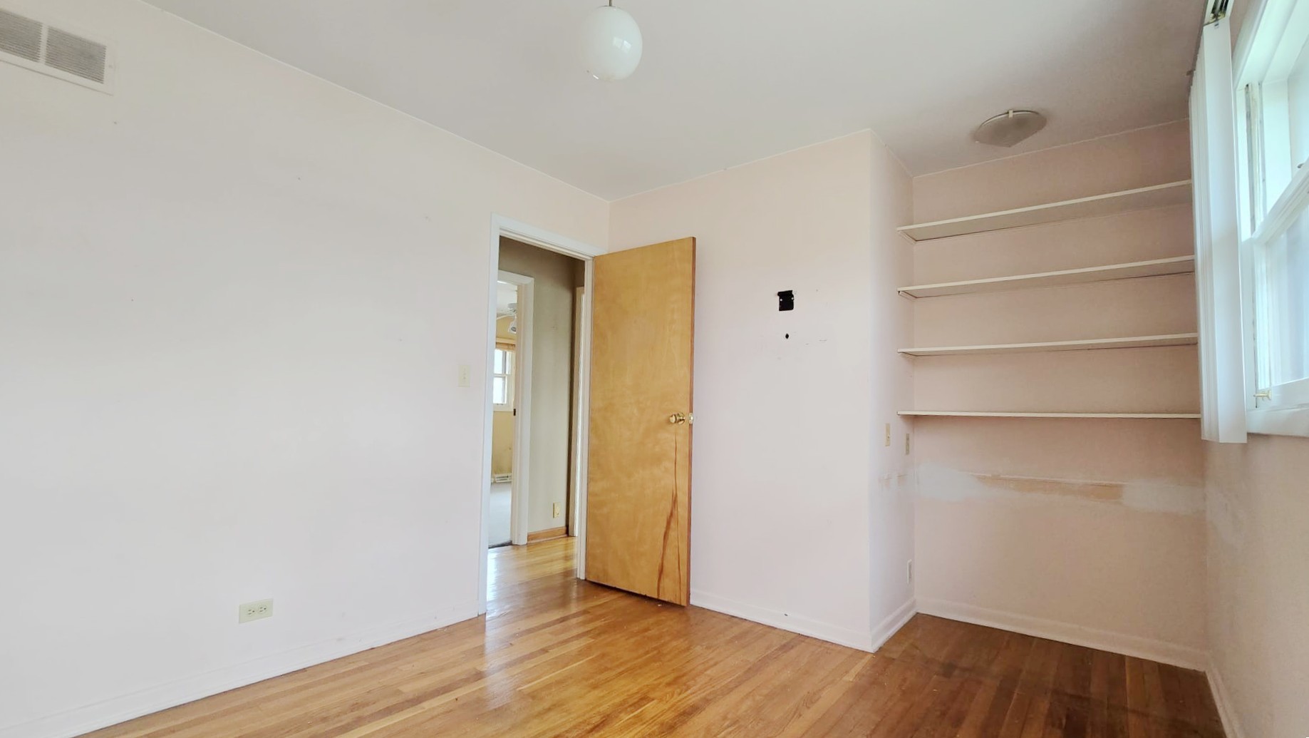 2736 Helen Drive Glenview, IL 60025 - Photo 40 of 47 a view of an empty room with wooden floor