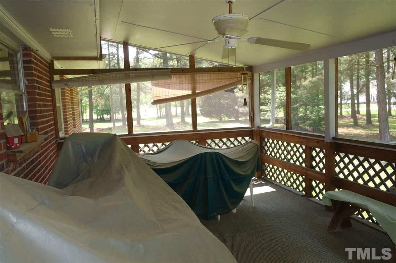 5700 Raleigh Road Kittrell, NC 27544 - Photo 18 of 20 The back screened porch - also has a small are for grilling
