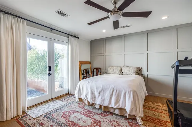 a bed room with a bed and a window