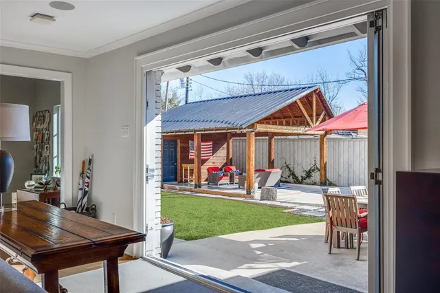 a view of a chairs and tables in patio