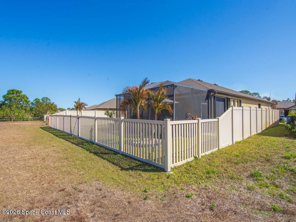 645 Old Country Rd S East Palm Bay, FL 32909 - Photo 26 of 42 a view of a fence in front of the house