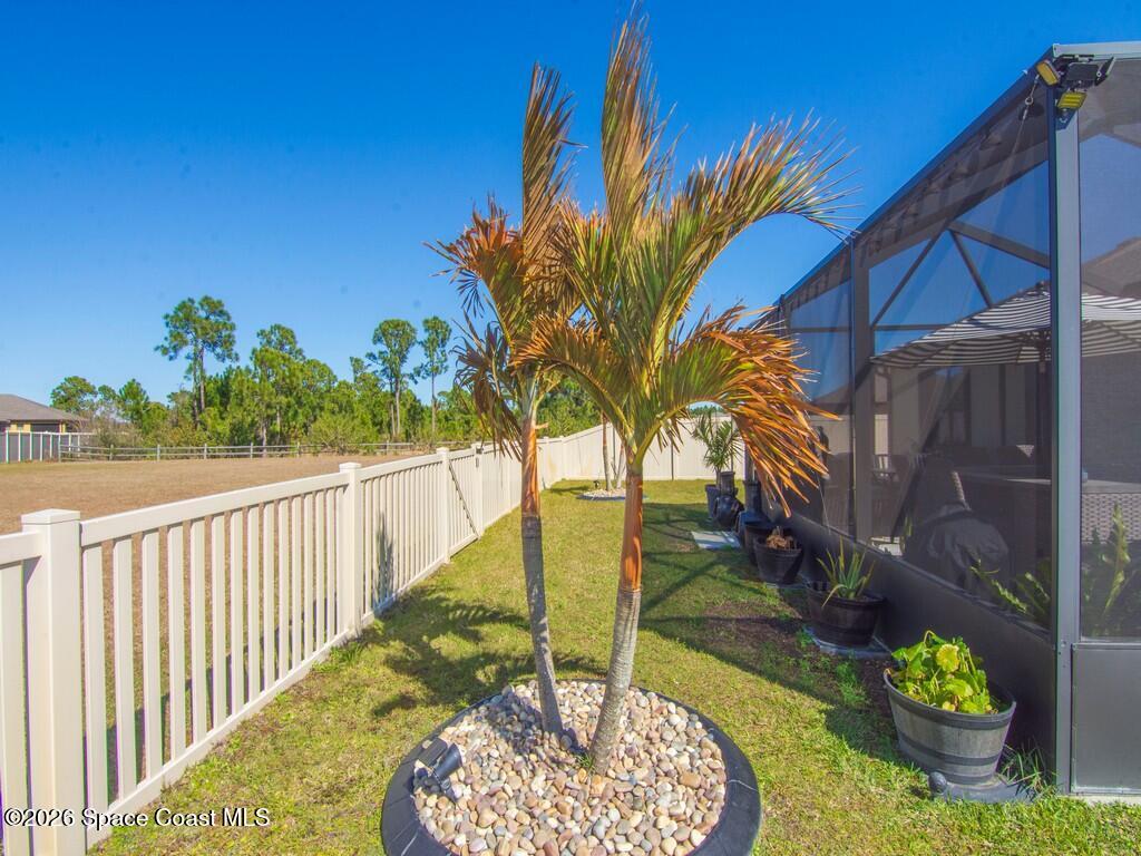 645 Old Country Rd S East Palm Bay, FL 32909 - Photo 27 of 42 a view of a backyard with plants