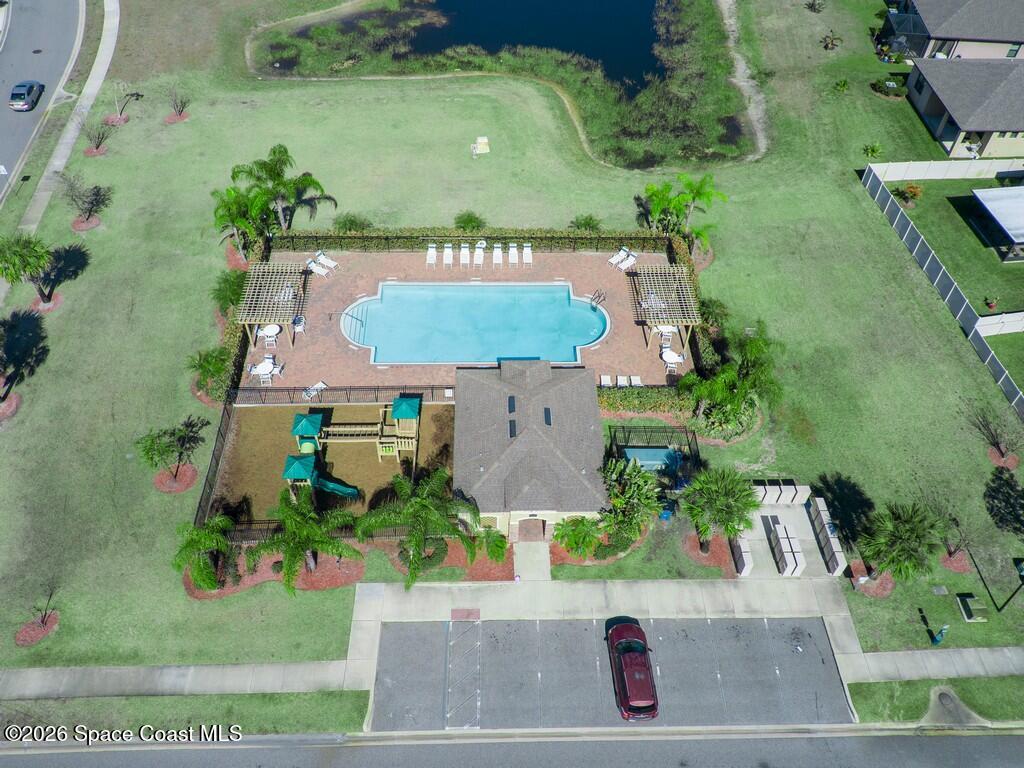 645 Old Country Rd S East Palm Bay, FL 32909 - Photo 32 of 42 an aerial view of a house with garden space ocean and houses