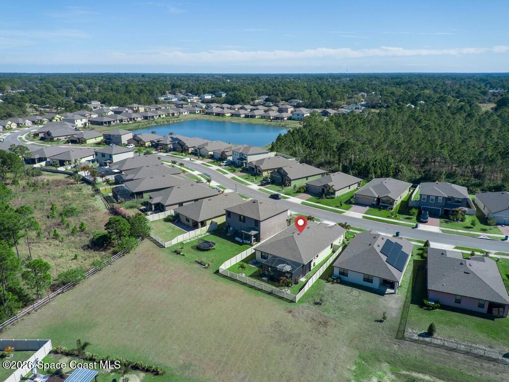 645 Old Country Rd S East Palm Bay, FL 32909 - Photo 41 of 42 an aerial view of a city with lots of residential buildings