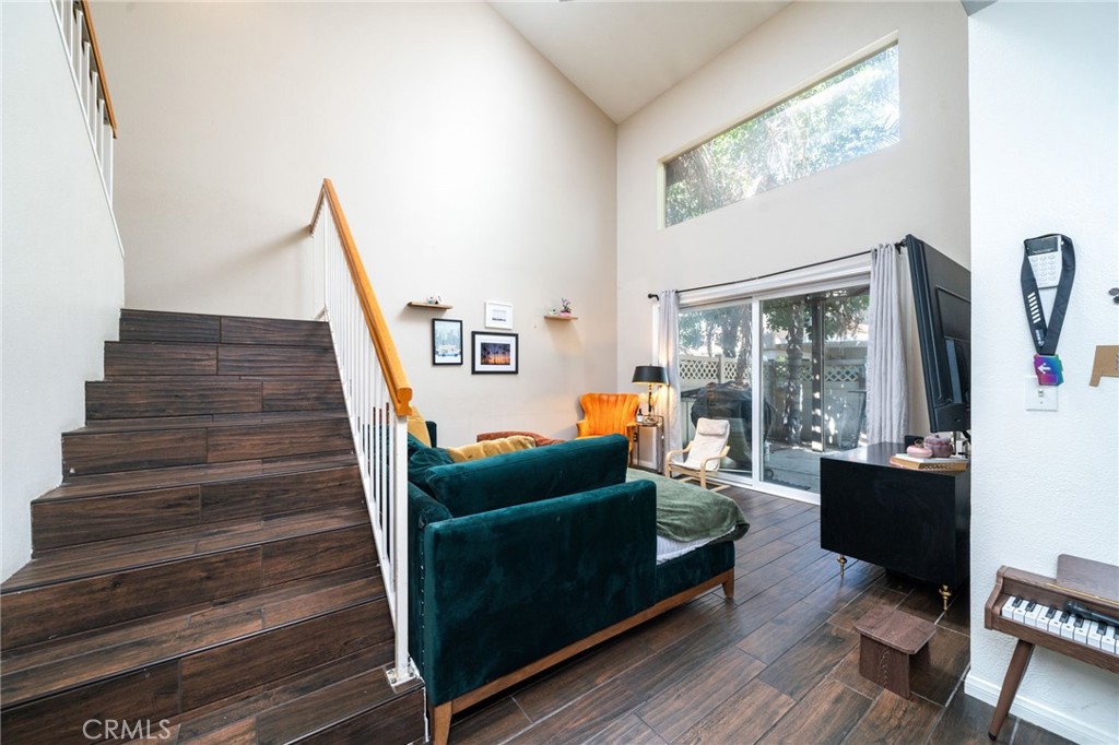 3707 Calle Curacso Riverside, CA 92503 - Photo 10 of 43 a living room with furniture and a floor to ceiling window