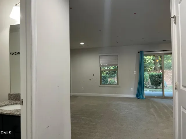 a view of a room with a window