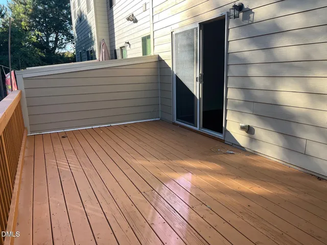 a bathroom with a granite countertop sink a toilet and bathtub