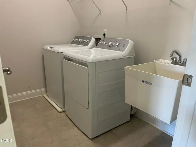 a bathroom with a granite countertop toilet sink and shower