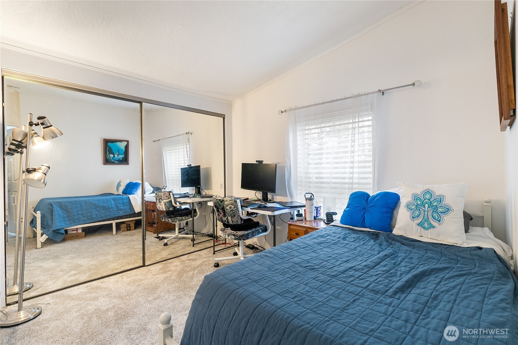 2350 Douglas Road, Unit 17 Ferndale, WA 98248 - Photo 25 of 32 a bedroom with a bed a couch and a window