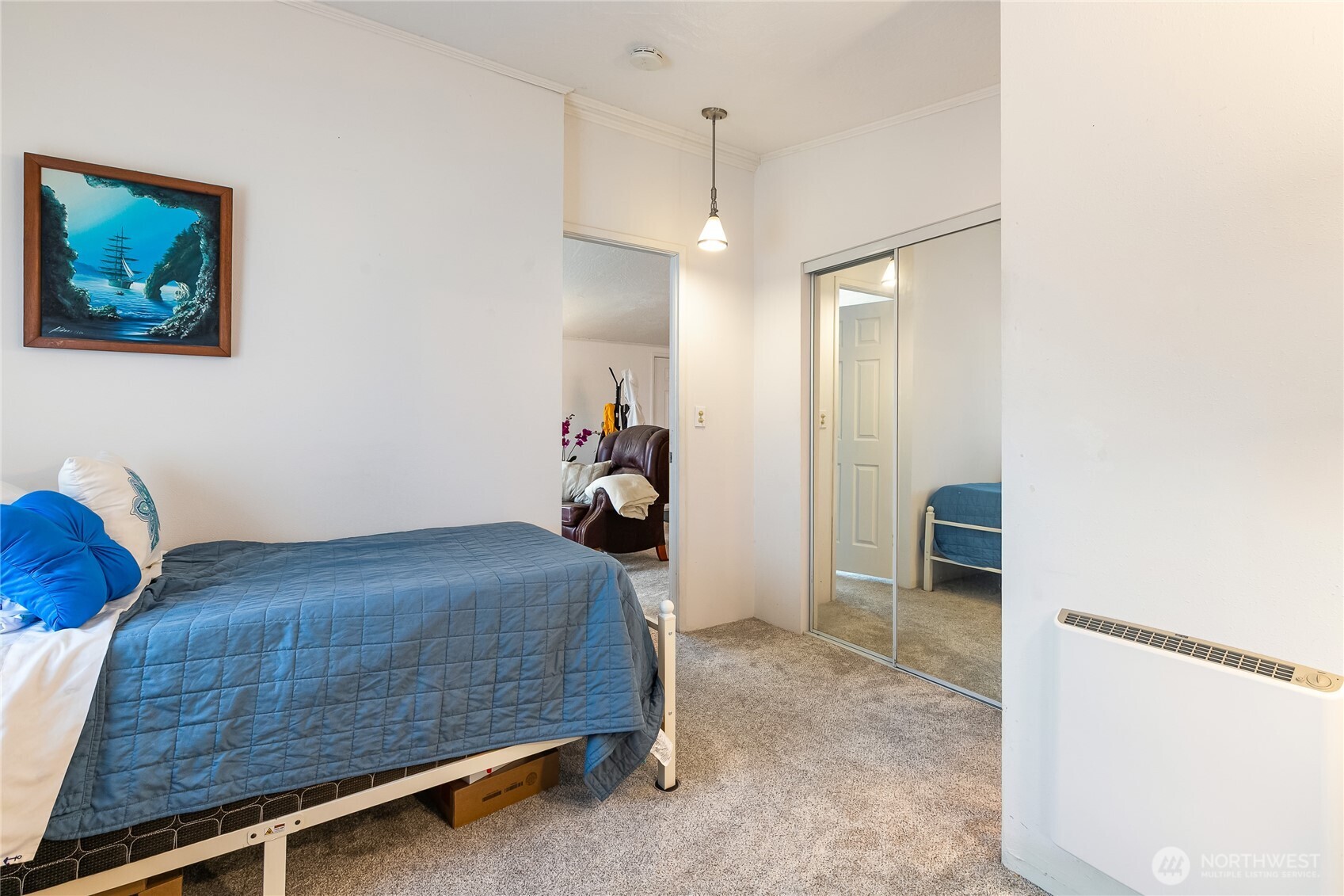 2350 Douglas Road, Unit 17 Ferndale, WA 98248 - Photo 26 of 32 a bedroom with a bed and a chandelier