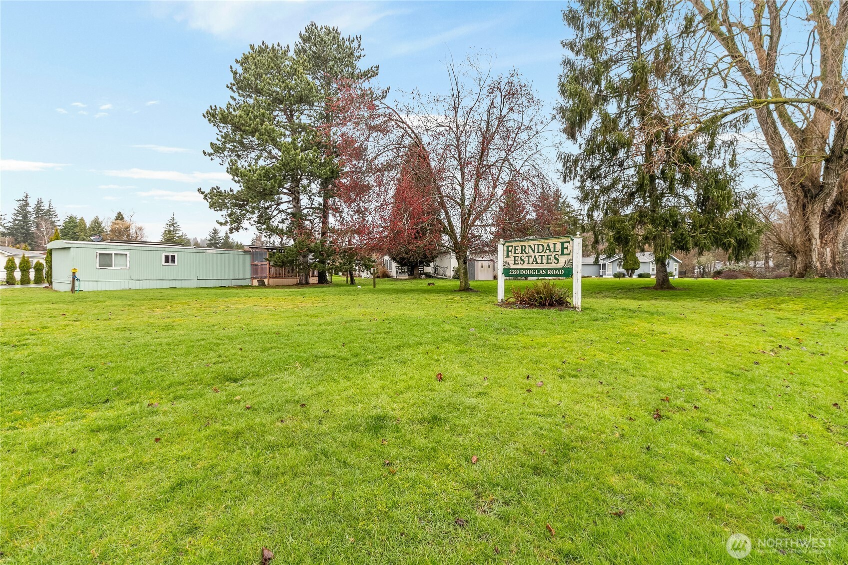 2350 Douglas Road, Unit 17 Ferndale, WA 98248 - Photo 30 of 32 a view of a big yard with palm trees