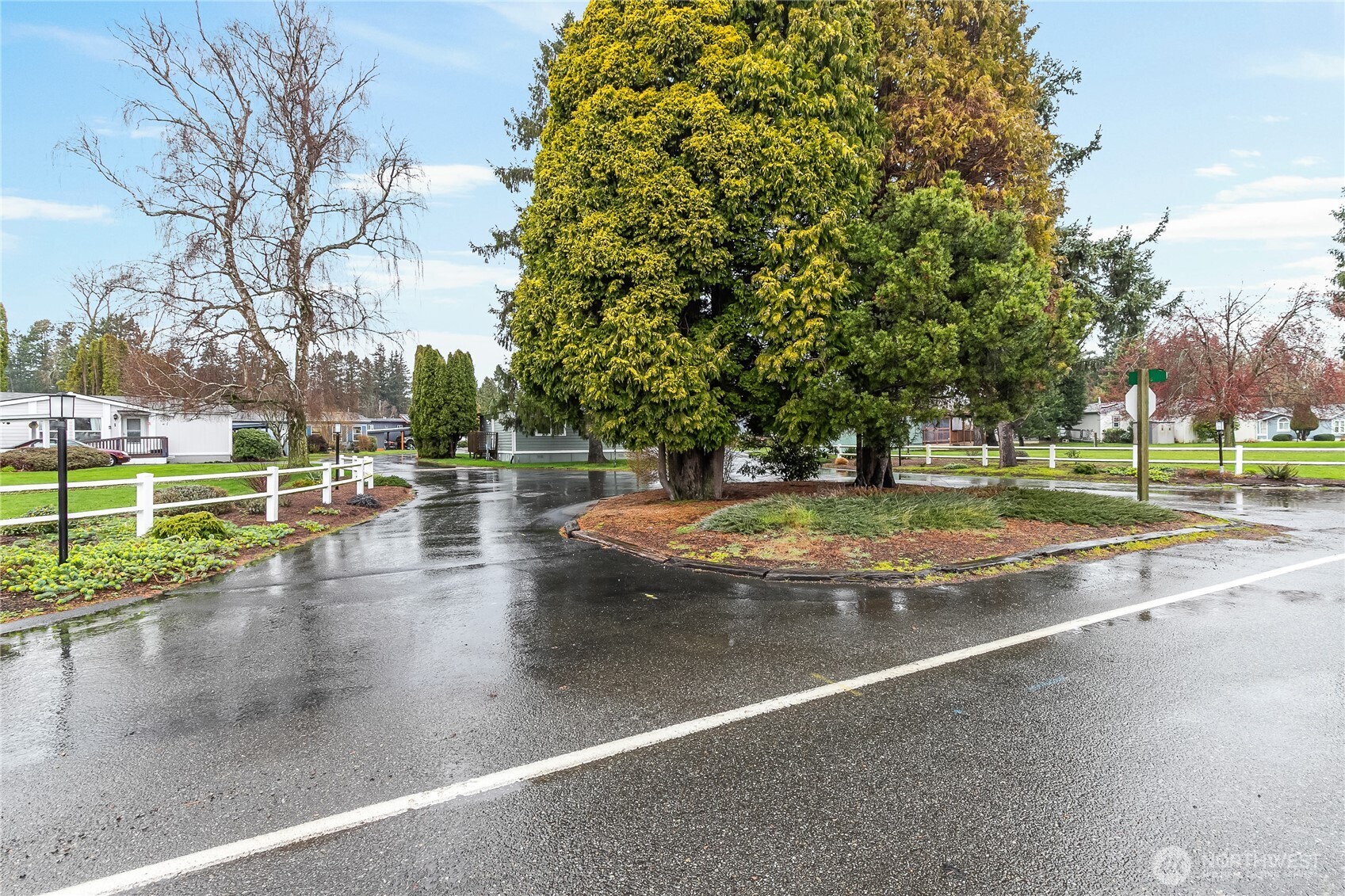 2350 Douglas Road, Unit 17 Ferndale, WA 98248 - Photo 31 of 32 a view of a swimming pool with a yard and plants